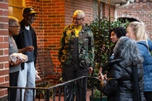 Joanice meets with community members