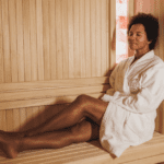 Young Black woman in a sauna to relieve sinus pressure