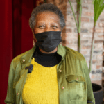 Photo of community member, Sheila J., in a mask