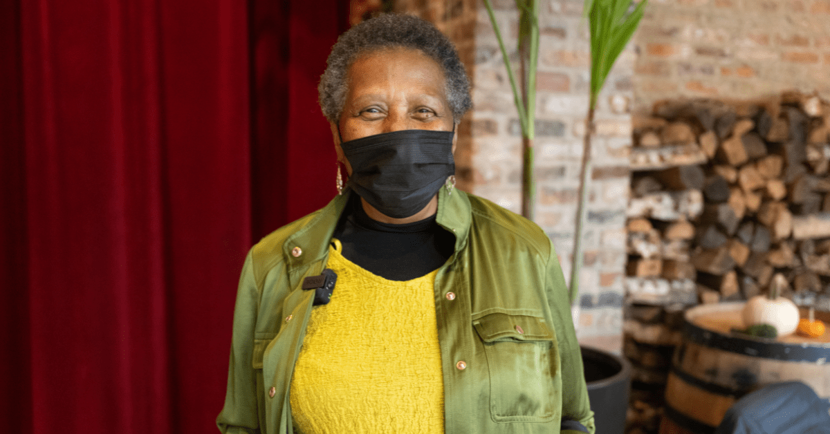 Photo of community member, Sheila J., in a mask