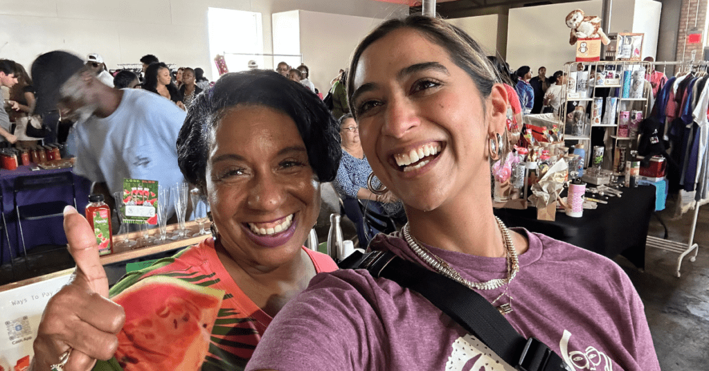 Two NOWINCLUDED community members taking a selfie at the Dallas Soul Food Festival