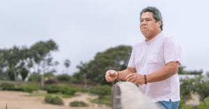 Man with vitiligo standing outside with a worried look on his face