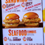 Close-up of menu at a Popeyes restaurant