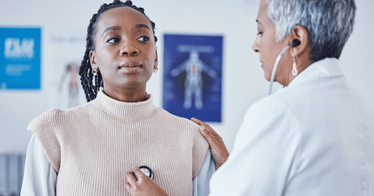 African American woman getting her heart checked at the doctor’s