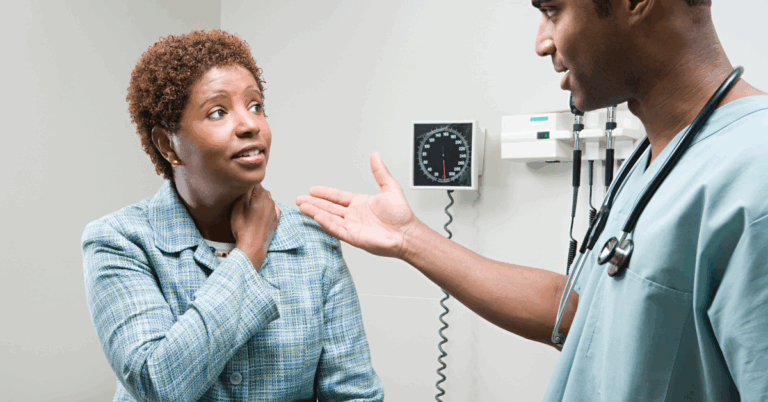 Does Microwaving Food Cause Cancer? 2 Black woman in a patient room holding her neck and explaining her symptoms to a South asian doctor