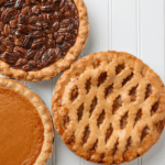 Holiday desserts that may raise your blood sugar; pecan pie, sweet potato pie, and apple pie, against a white background