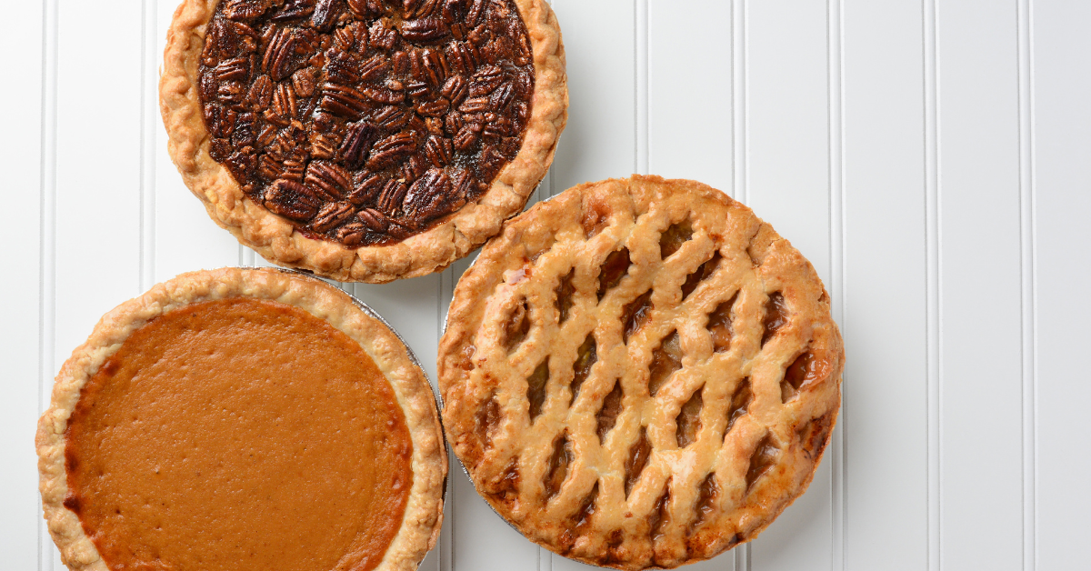 Holiday desserts that may raise your blood sugar; pecan pie, sweet potato pie, and apple pie, against a white background