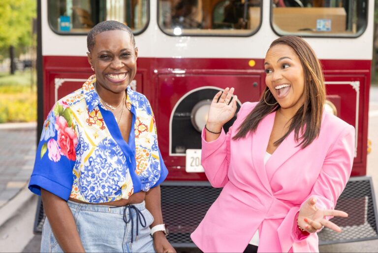 Tiffany Whitlow, Co-founder and CDO, Acclinate and Veronica Riley, pre-eclampsia survivor, sharing a joyful moment and laughing together outdoors.