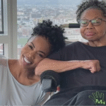 Actress and caregiver, Brandee Evans, smiling while leaning her head on her mother, Diana Harrington, who lives with multiple sclerosis and early-onset Alzheimer's.