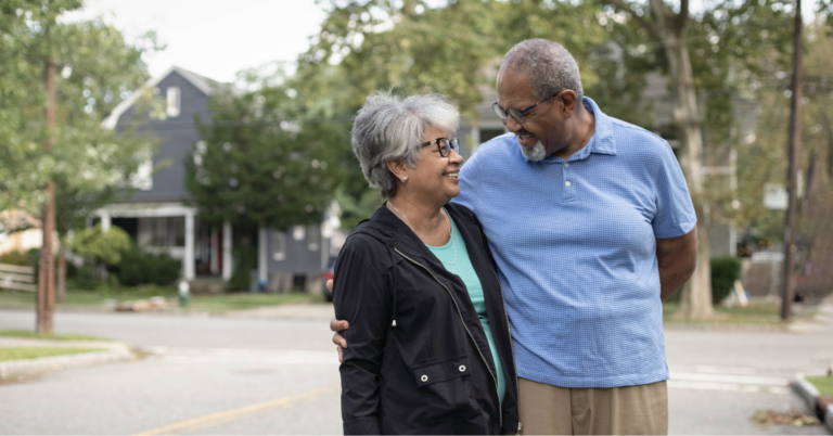 7 Latest Cancer Research Breakthroughs to Know About 1 Older Black couple taking a walk outside, one of the ways dementia can be prevented